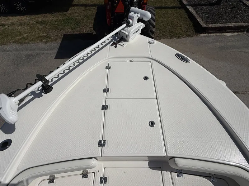 Slide: The Image of Deck of 2026 Robalo 246 Cayman with storage and motor. - 11