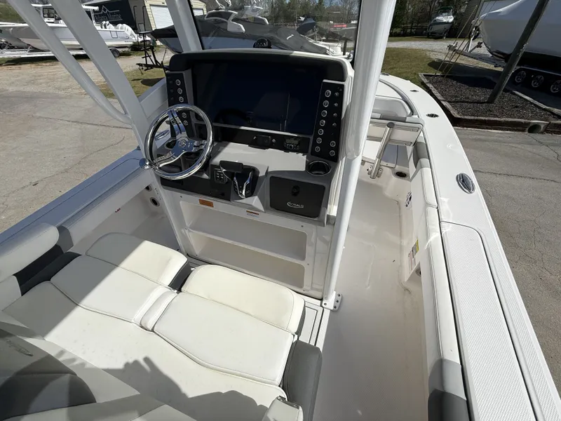 Slide: The Image of Interior view of the 2026 Robalo 246 Cayman boat. - 6