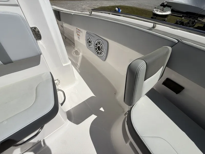 Slide: The Image of Interior of 2026 Robalo R300 Center Console with seating area. - 12
