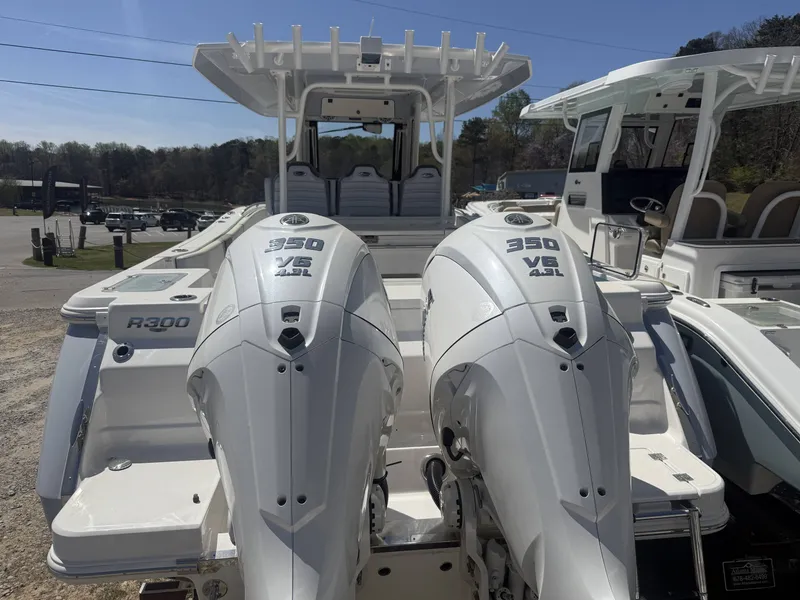 Slide: The Image of 2026 Robalo R300 Center Console with twin 350 HP engines. - 3