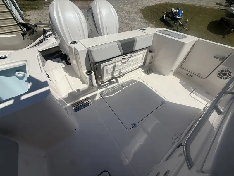 Slide: The Image of 2026 Robalo R300 Center Console with spacious deck and storage. - 6