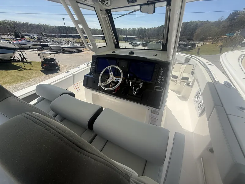 Slide: The Image of Interior view of the 2026 Robalo R300 Center Console boat. - 7