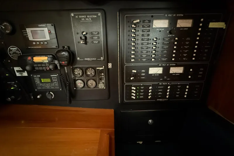 Slide: The Image of Electrical control panel of a 2000 Cabo Rico Cutter 45 sailboat. - 46