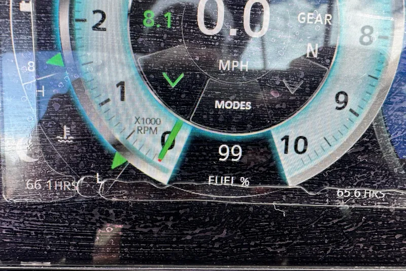 Slide: The Image of Dashboard of 2023 Scarab 215 ID showing speed, RPM, and fuel percentage. - 28