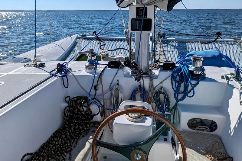Slide: The Image of Cockpit of 2003 Chris White Atlantic 42 catamaran with ropes and steering wheel. - 16