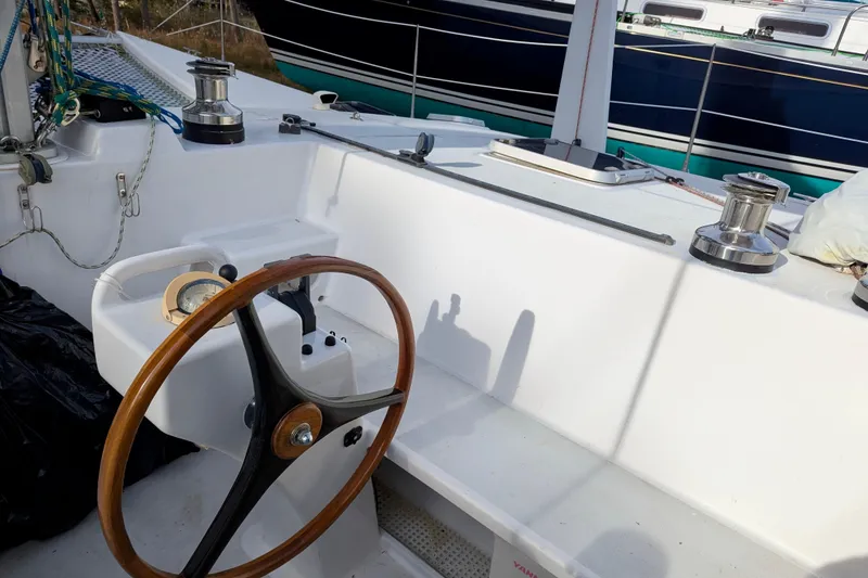 Slide: The Image of Steering wheel and deck of 2003 Chris White Atlantic 42 sailboat. - 18