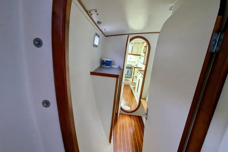 Slide: The Image of Interior view of 2003 Chris White Atlantic 42 yacht with wooden flooring and white walls. - 50