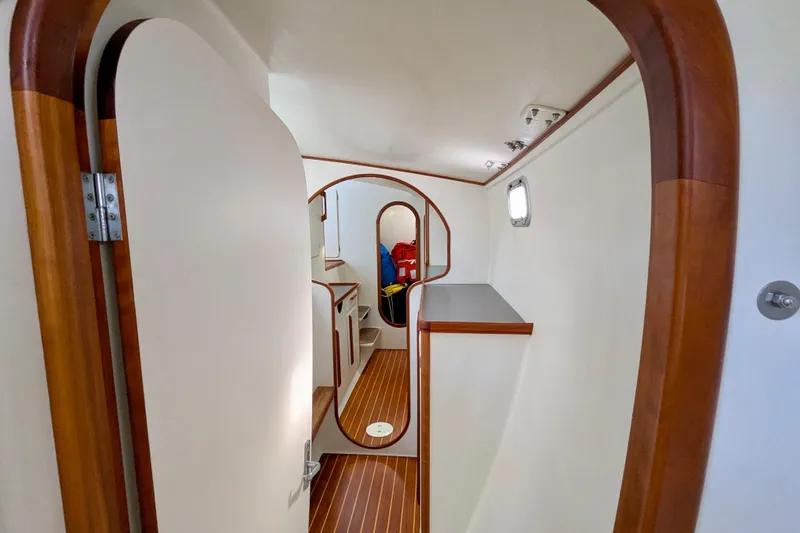 Slide: The Image of Interior of 2003 Chris White Atlantic 42 yacht with wooden trim and modern design. - 57