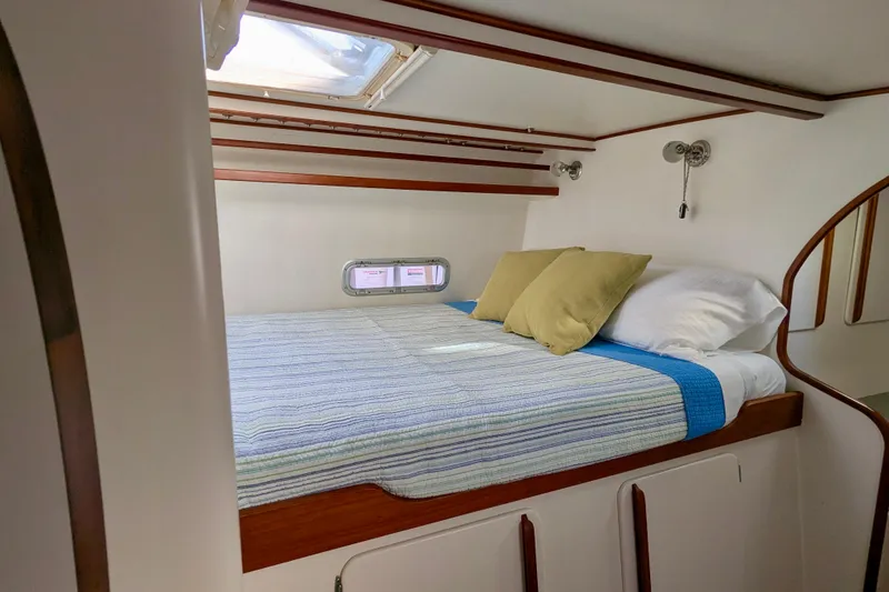 Slide: The Image of Cozy cabin interior of 2003 Chris White Atlantic 42 yacht with bed and porthole. - 59