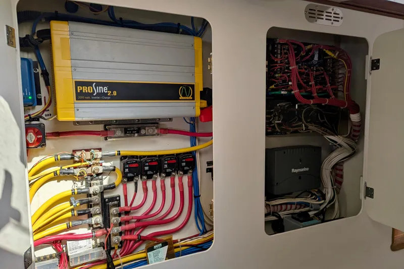 Slide: The Image of Electrical system inside a 2003 Chris White Atlantic 42 yacht, featuring ProSine inverter. - 69
