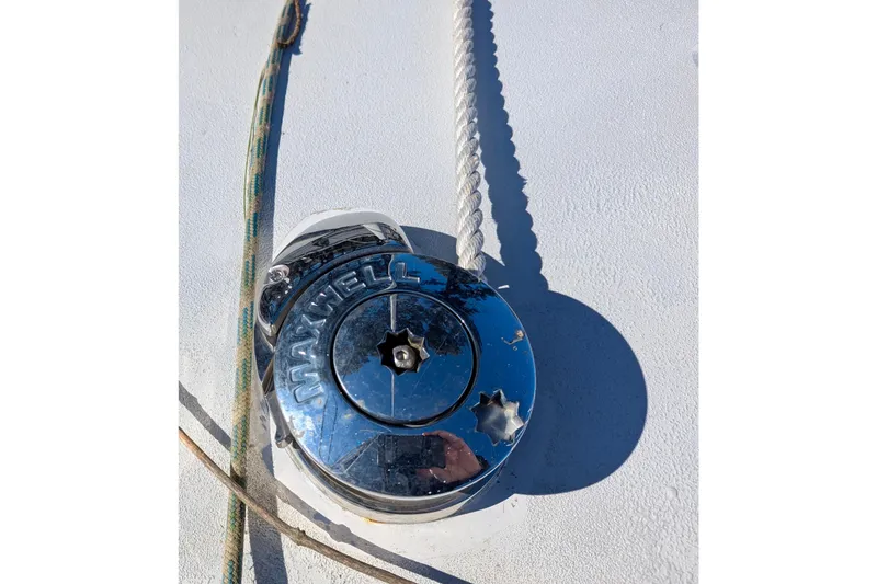 Slide: The Image of Chrome winch on 2003 Chris White Atlantic 42 sailboat deck. - 73