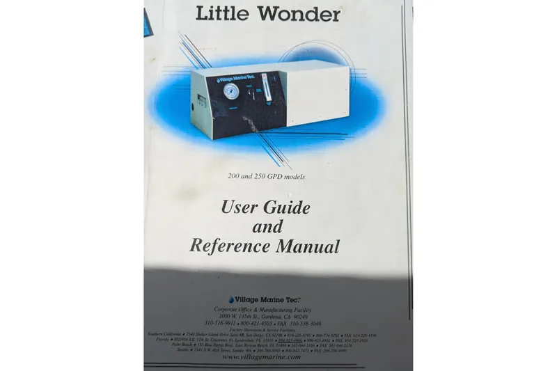 Slide: The Image of Little Wonder user guide cover for Village Marine Tec watermaker, 200 and 250 GPD models. - 78