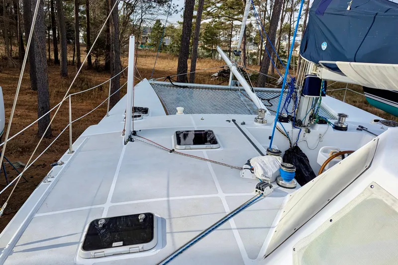 Slide: The Image of Deck view of 2003 Chris White Atlantic 42 catamaran, featuring rigging and hatches. - 8