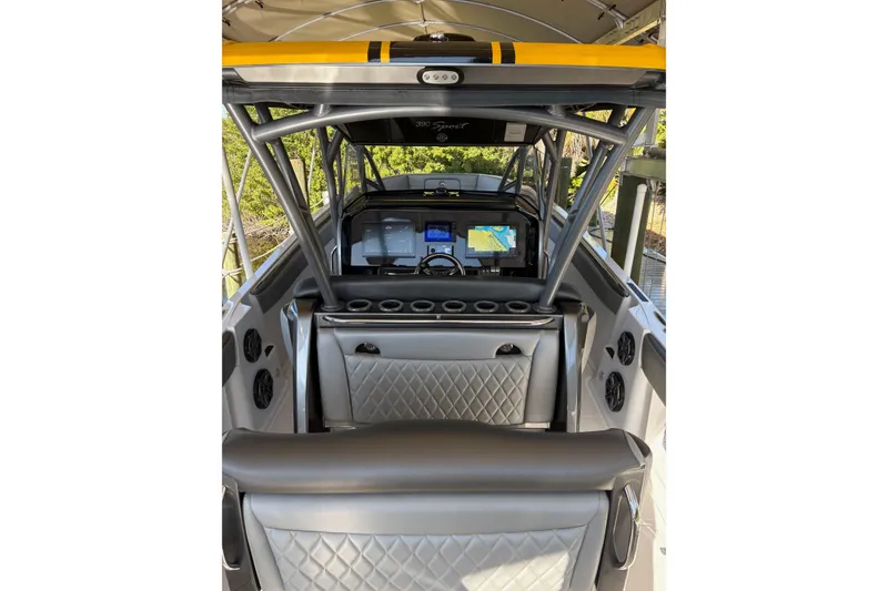 Slide: The Image of 2017 Nor-Tech 390 Sport Center Console interior with modern dashboard and seating. - 19