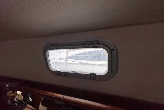 Slide: The Image of Interior view of a 1996 Beneteau 50 yacht porthole. - 103