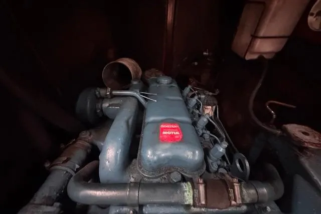 Slide: The Image of Engine of a 1996 Beneteau 50 sailboat, featuring a Motul-branded component. - 108