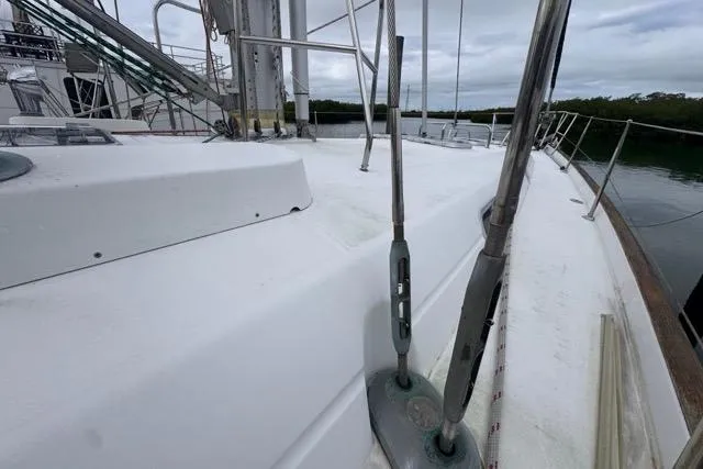 Slide: The Image of Deck view of a 1996 Beneteau 50 sailboat, showcasing clean lines and sturdy rigging. - 31