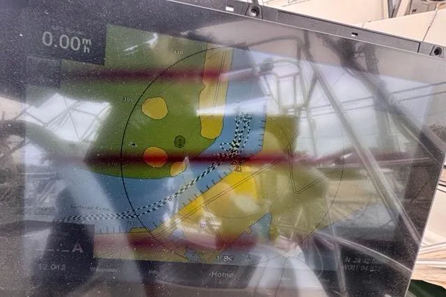 Slide: The Image of Navigation screen on a 1996 Beneteau 50 sailboat, displaying nautical chart. - 40