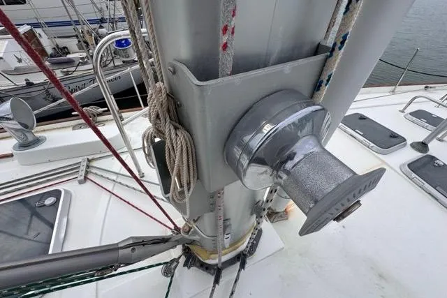 Slide: The Image of Deck view of a 1996 Beneteau 50 sailboat, featuring mast and rigging details. - 67