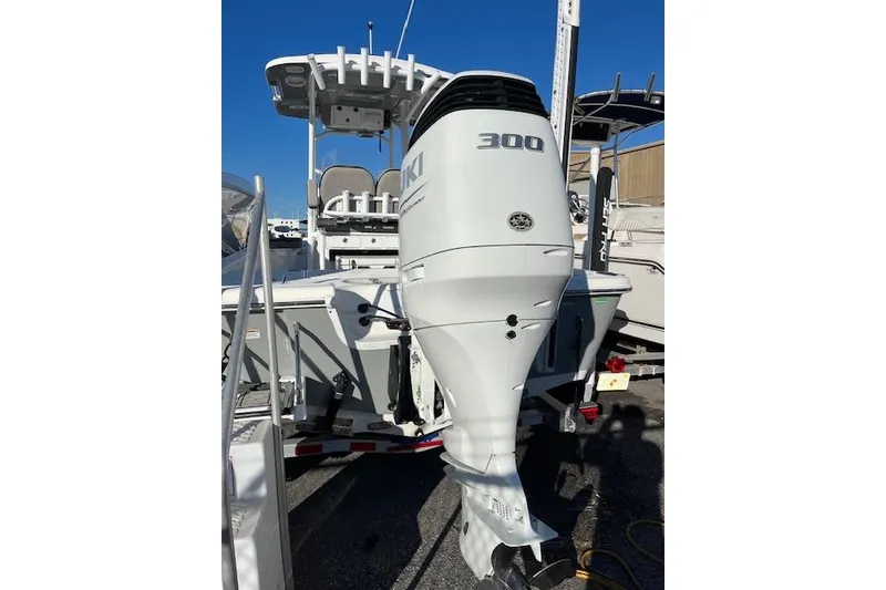 Slide: The Image of 2023 Sea Pro 248 Bay boat with powerful 300 HP outboard motor. - 2