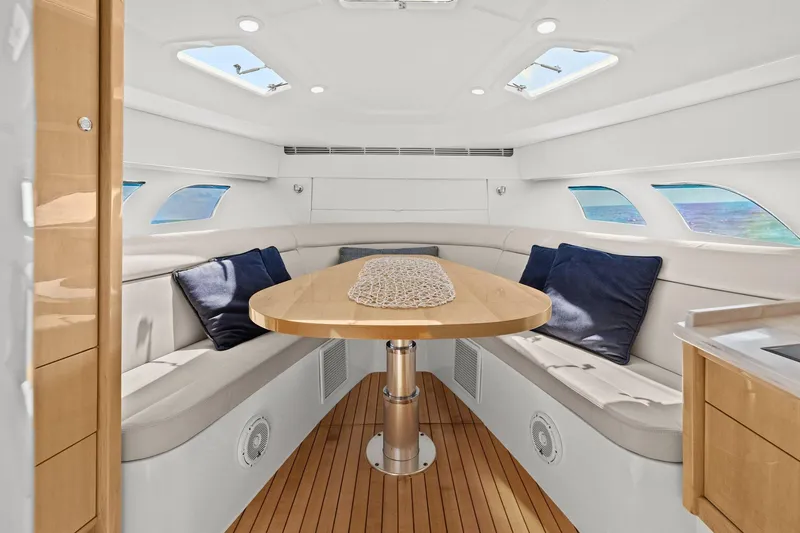 Slide: The Image of Luxurious interior of 2019 Intrepid 475 yacht with modern design and ocean view windows. - 17
