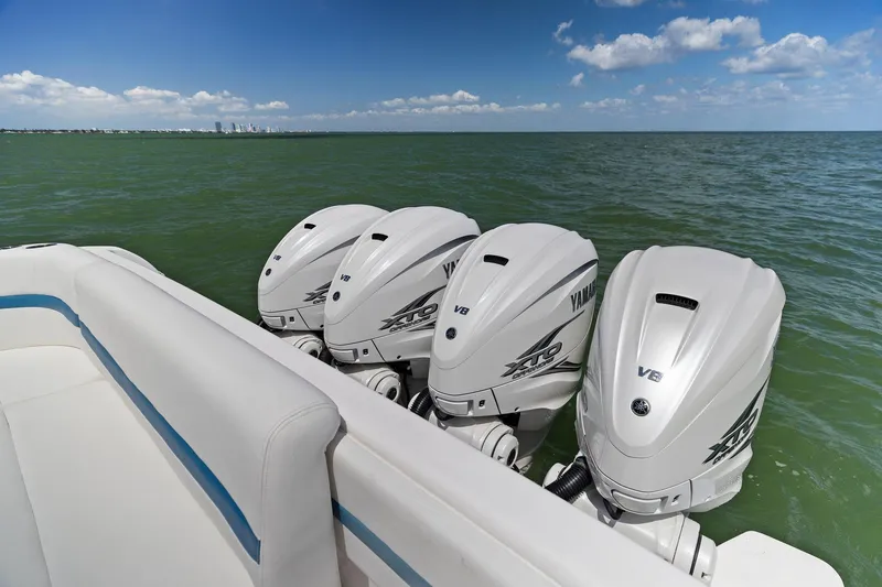 Slide: The Image of Four Yamaha V8 outboard engines on a 2019 Intrepid 475 boat, ocean backdrop. - 5