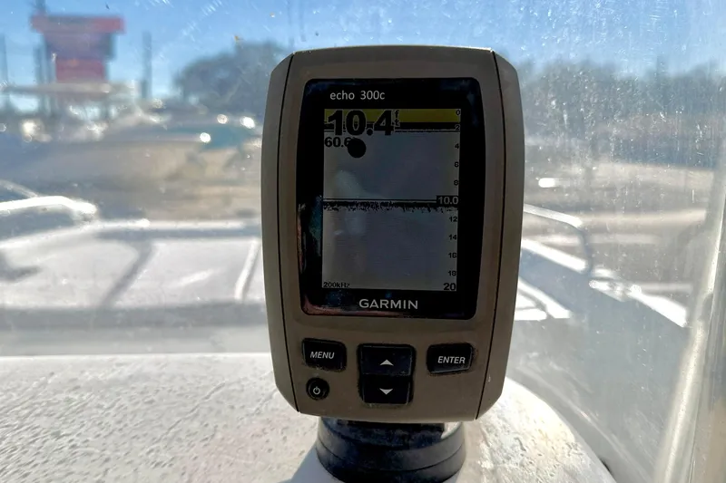Slide: The Image of Garmin echo 300c fishfinder on 2011 Carolina Cat 18 CC boat dashboard. - 18