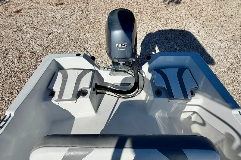 Slide: The Image of 2011 Carolina Cat 18 CC boat with Yamaha 115 engine, rear seating view. - 20