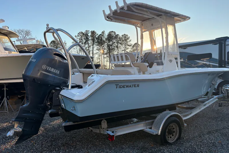 Slide: The Image of 2018 Tidewater 210 LXF boat with Yamaha engine on trailer at sunset. - 3