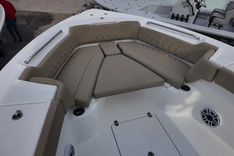 Slide: The Image of 2026 Blazer 2600 Makaira boat interior with tan seating and modern controls. - 11