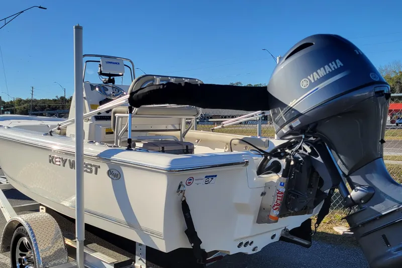 Slide: The Image of 2024 Key West 188 Bay Reef boat with Yamaha outboard motor on trailer. - 4