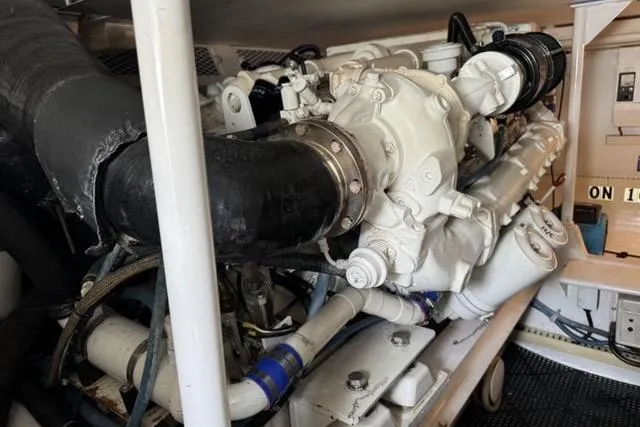 Slide: The Image of 1996 Viking 50 Sport Fisher Convertible cruising on open water, aerial view. - 19