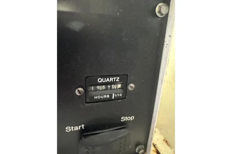 Slide: The Image of 1996 Viking 50 Sport Fisher Convertible cruising on open water, creating a dynamic wake. - 22