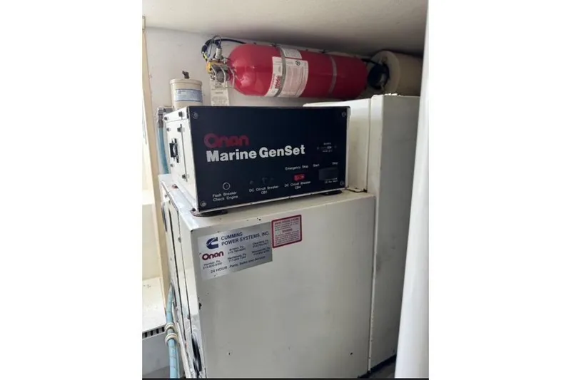 Slide: The Image of 1996 Viking 50 Sport Fisher Convertible cruising on open water, creating a dynamic wake. - 23