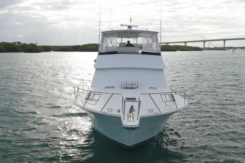 Slide: The Image of 1996 Viking 50 Sport Fisher Convertible yacht on open water, front view. - 32