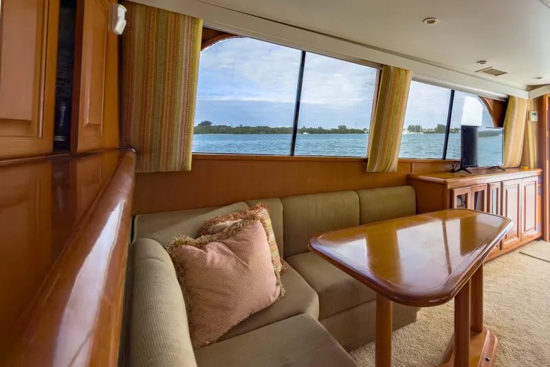Slide: The Image of Luxurious interior of 1996 Viking 50 Sport Fisher yacht with scenic water view. - 35