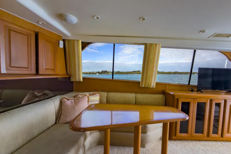 Slide: The Image of Interior of 1996 Viking 50 Sport Fisher yacht with scenic window view. - 36