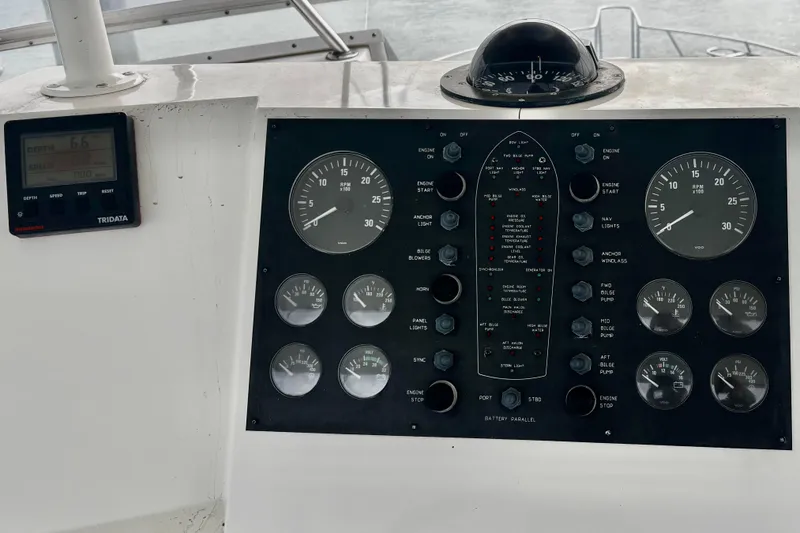 Slide: The Image of Control panel of a 1996 Viking 50 Sport Fisher Convertible boat. - 57