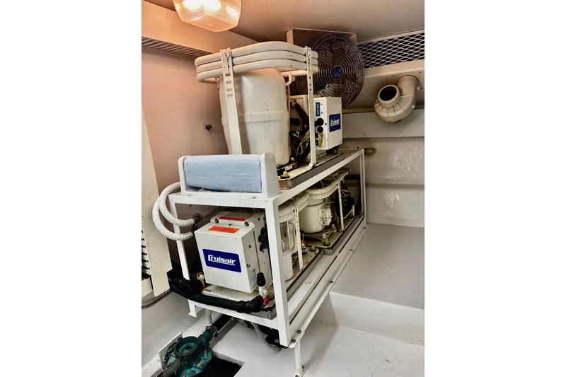 Slide: The Image of Engine room of 1996 Viking 50 Sport Fisher with Cruisair system. - 60