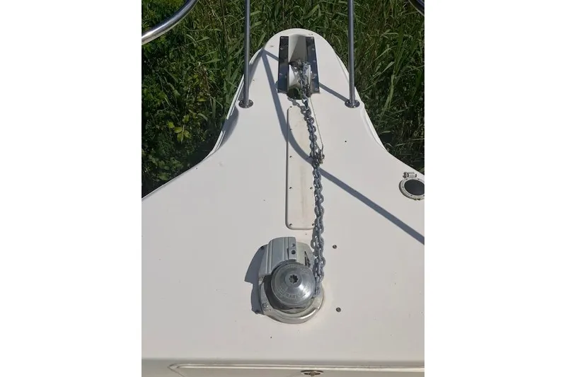 Slide: The Image of Bow of 1997 Sea Ray 440 Express with anchor chain and windlass. - 6