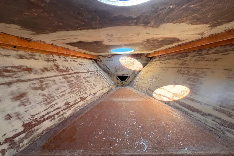 Slide: The Image of Interior view of 2025 Don Smith Custom 55' boat hull under construction. - 21