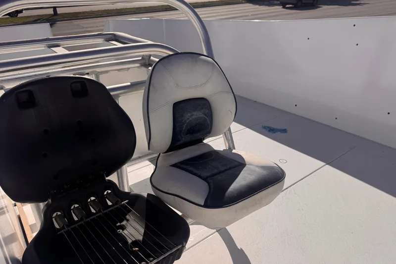 Slide: The Image of Two seats on a 2025 Don Smith Custom 55' boat deck. - 24