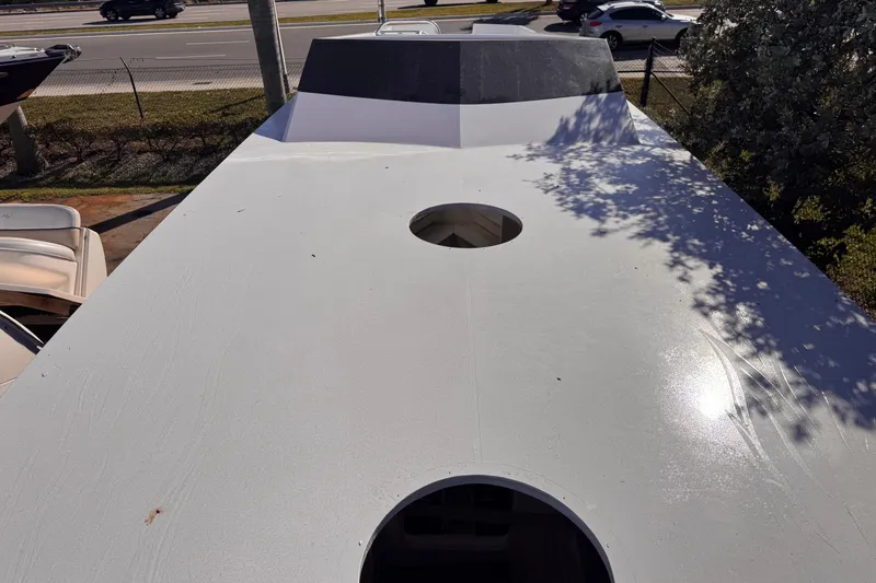 Slide: The Image of Top view of a 2025 Don Smith Custom 55' boat under sunlight. - 8