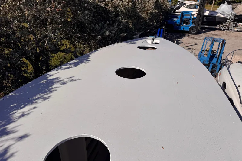 Slide: The Image of Top view of a 2025 Don Smith Custom 55' boat under construction. - 9