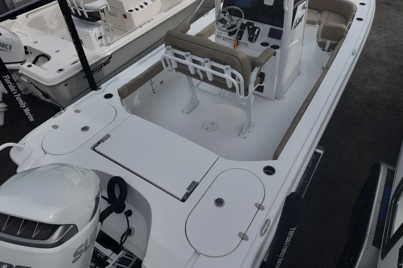 Slide: The Image of 2026 Blazer Bay 2440 boat with Suzuki engine, docked at Florida's Family Marine. - 4