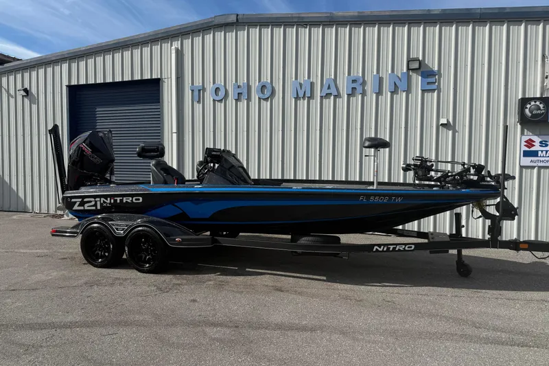 Slide: The Image of 2024 Nitro Z21 XL Pro boat at Toho Marine dealership, side view. - 0