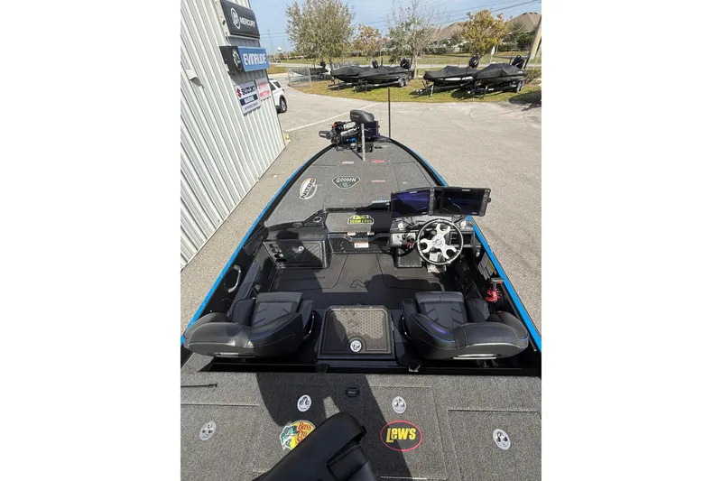 Slide: The Image of 2024 Nitro Z21 XL Pro fishing boat interior with advanced navigation and seating. - 7