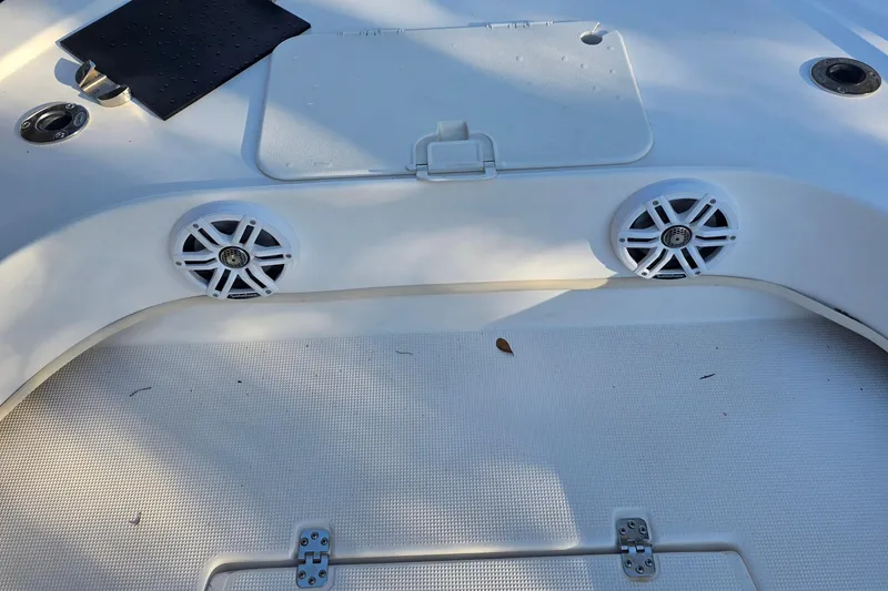 Slide: The Image of Dusky 203 boat deck with speakers and hatch, 2005 model. - 6