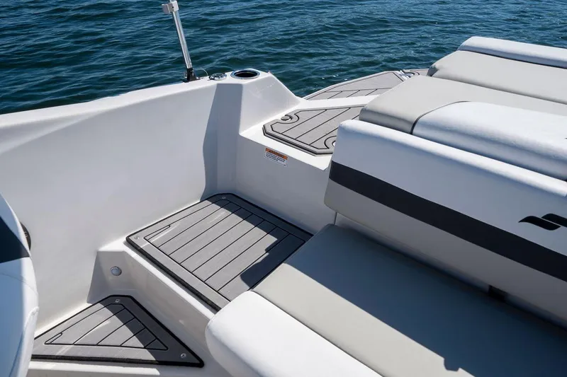 Slide: The Image of Starcraft SVX 231 IO 2026 boat interior on water. - 4