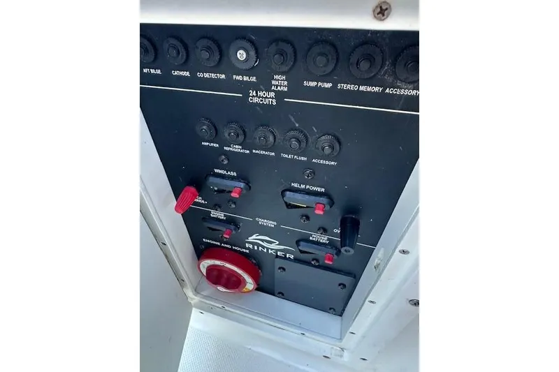 Slide: The Image of Control panel of a 2014 Rinker 260 Express Cruiser boat. - 11